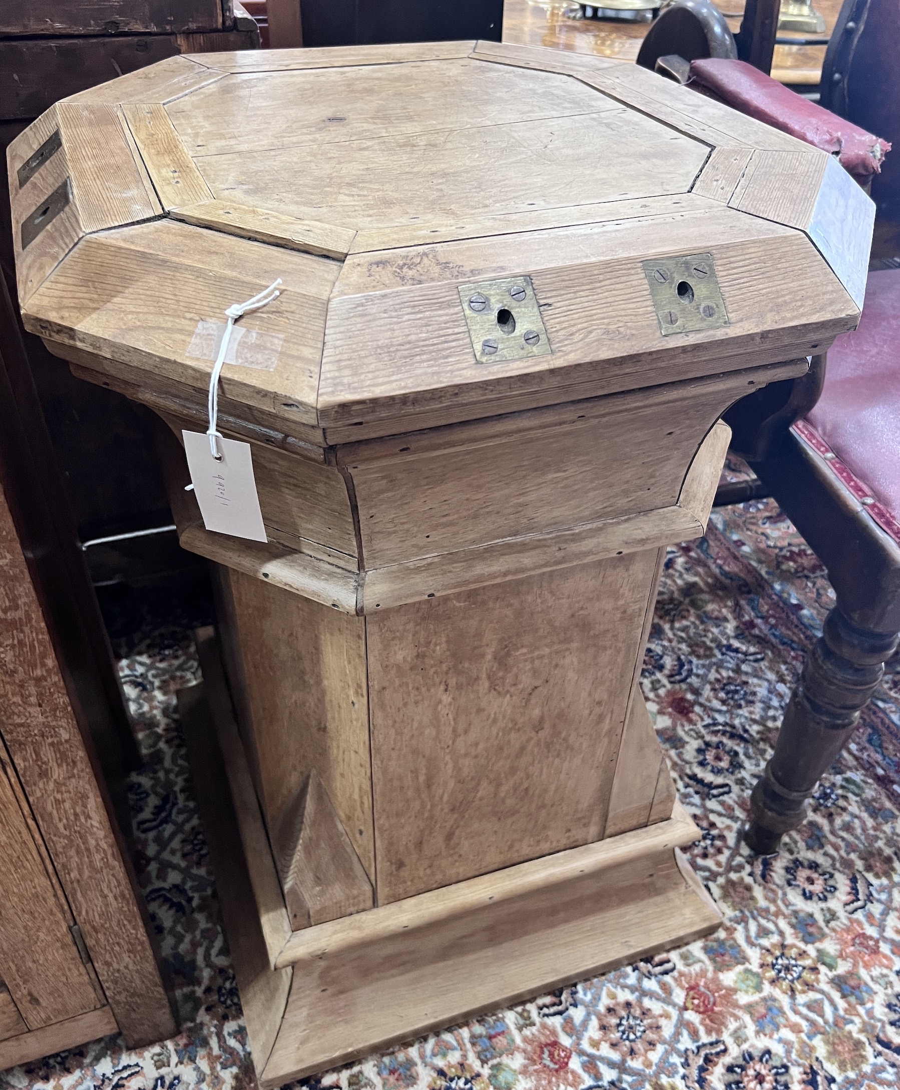 A 19th century Gothic pine octagonal plinth, width 54cm, height 77cm